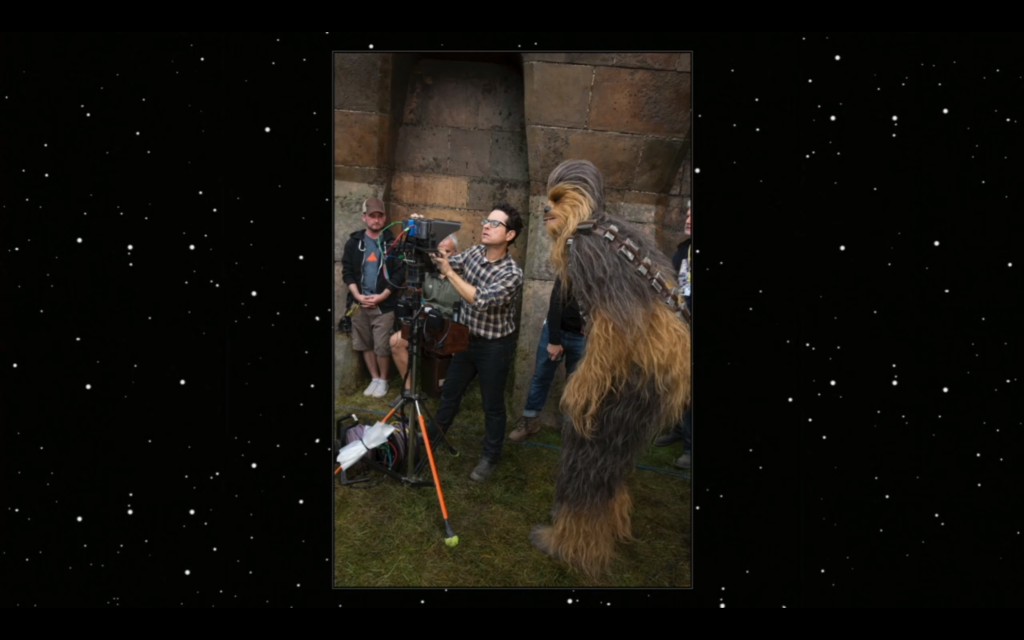 J.J. Abrams poses with Chewbacca on set.