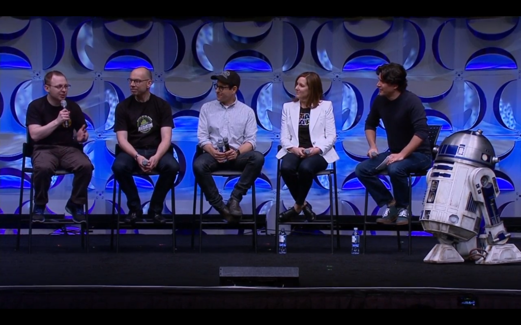 Droid builders arrive on stage alongside J.J. Abrams and Kathleen Kennedy.